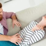 entertainment-funtime-wife-husband-living-room-spouse-two-partners-picture-id982403318