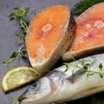 raw-fish-sea-bass-and-salmon-picture-id958118108