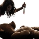 one  strange young woman killing her teddy bear in silhouette white background