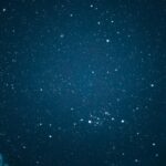 night-sky-with-stars-and-clouds-picture-id532378051