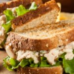 tuna-sandwich-with-lettuce-on-wheat-toast-picture-id467760245