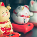 Símbolos Japoneses. Los amuletos de la mitología japonesa. Maneki neko