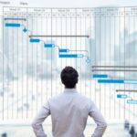 project-manager-working-with-gantt-chart-planning-schedule-tracking-picture-id1283488555 (1)