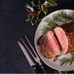 roasted-beef-christmas-decorations-new-year-dinner-table-picture-id1282749423